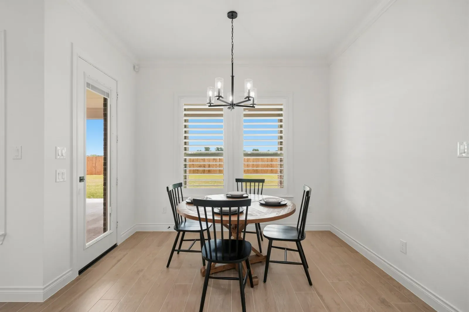 Dining room with a door to the covered patio