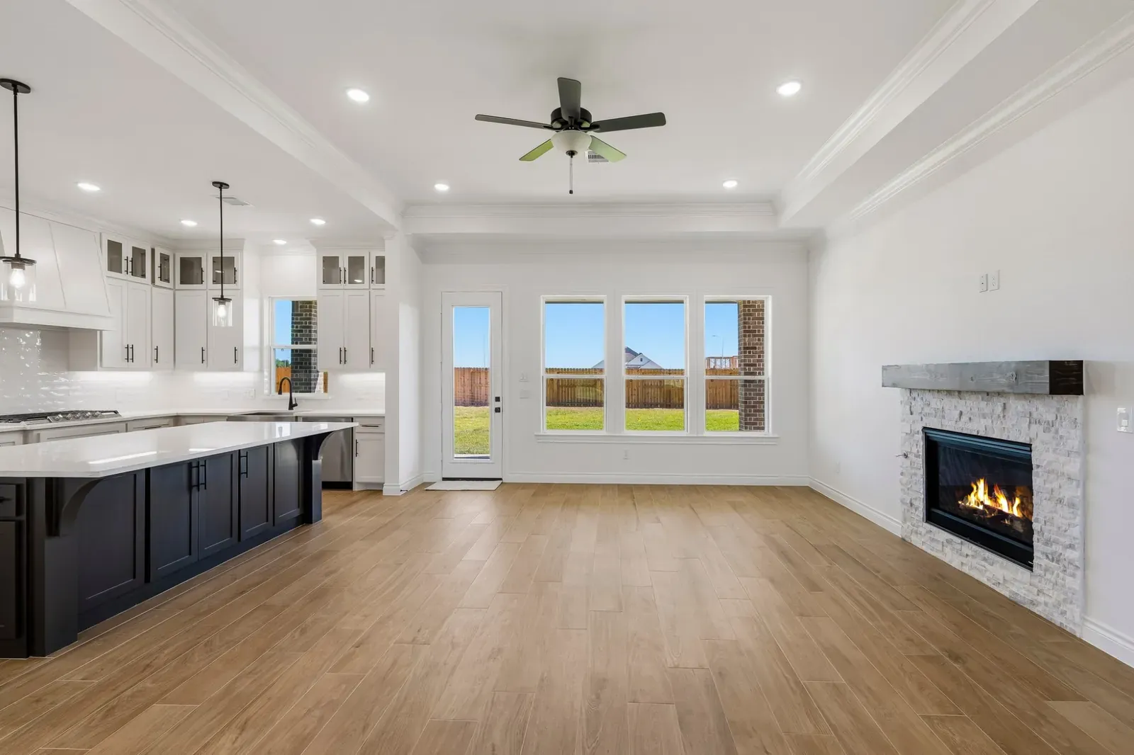 Great room with fireplace and patio door