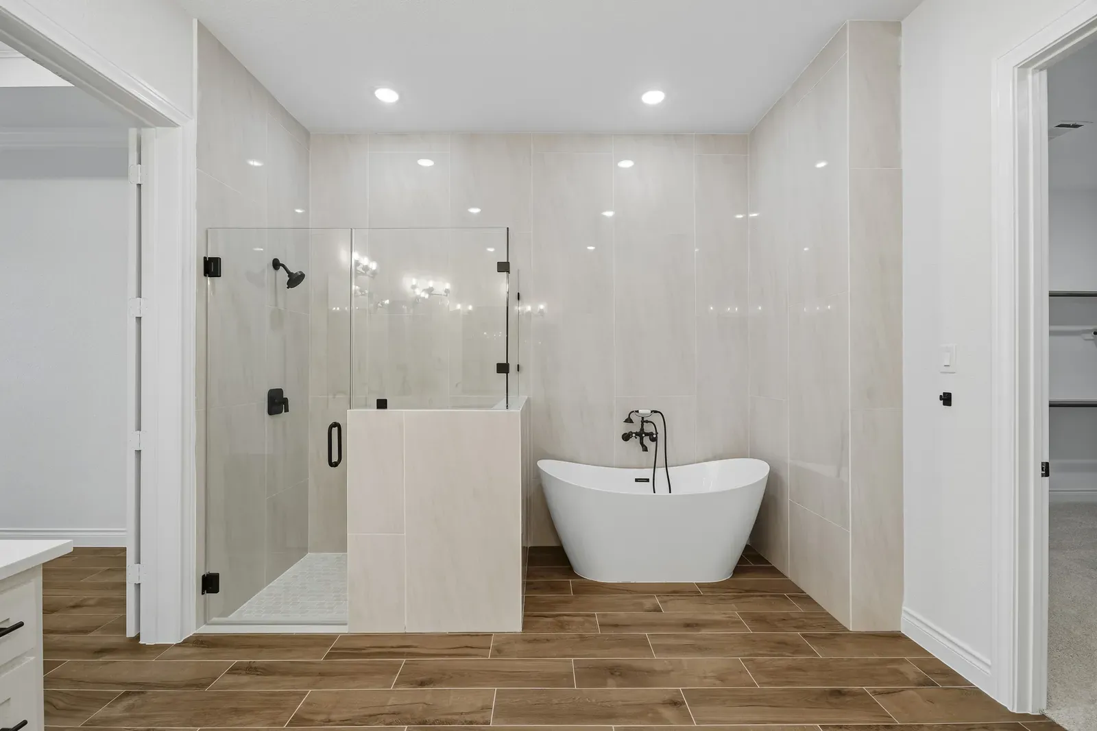 Primary bath with a walk-in shower and freestanding tub