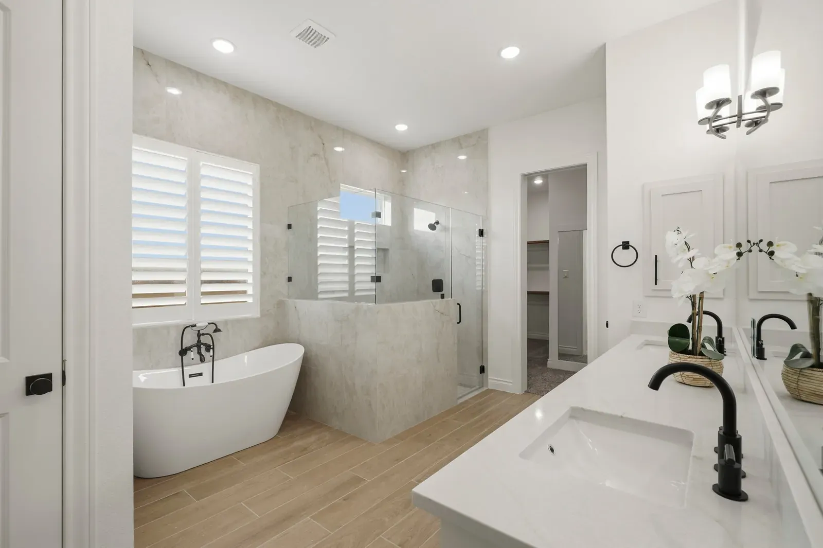 Primary bath with a freestanding tub and walk-in shower