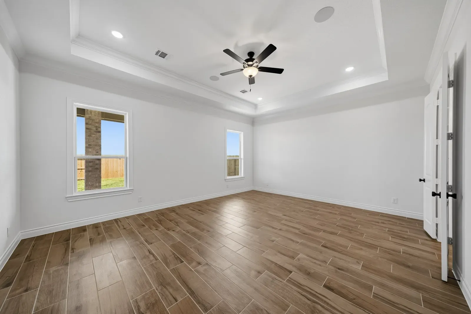 Primary retreat with a tray ceiling